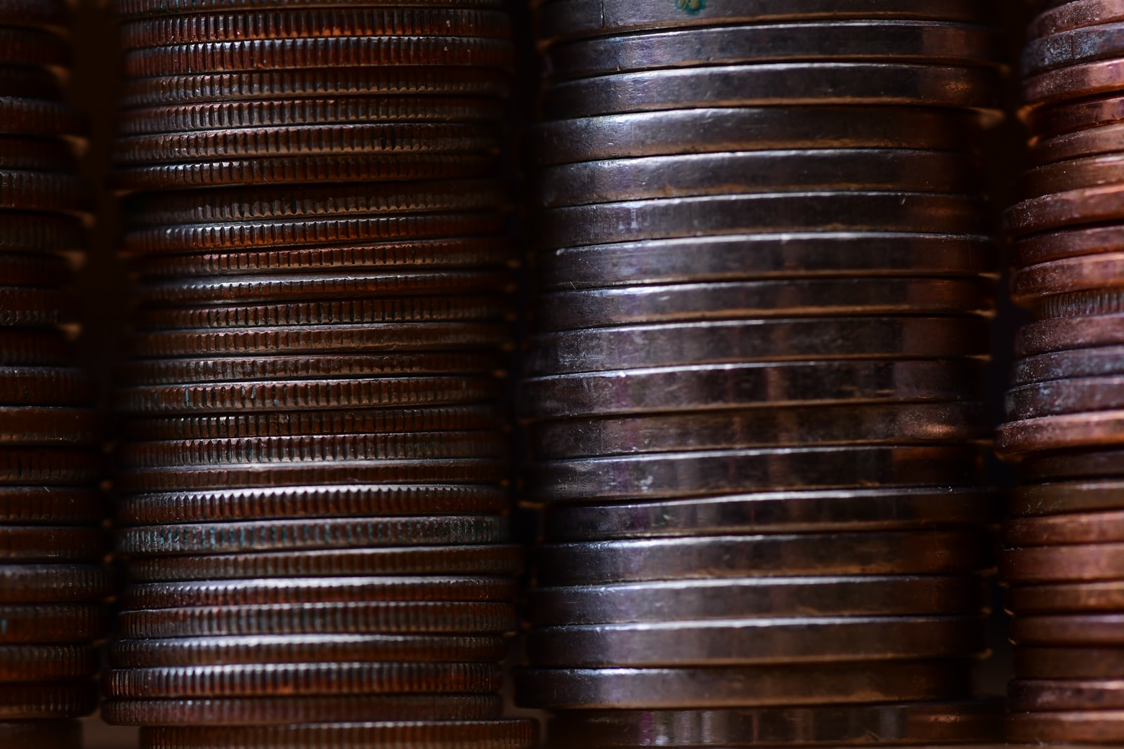 round gold-colored coin lot pile