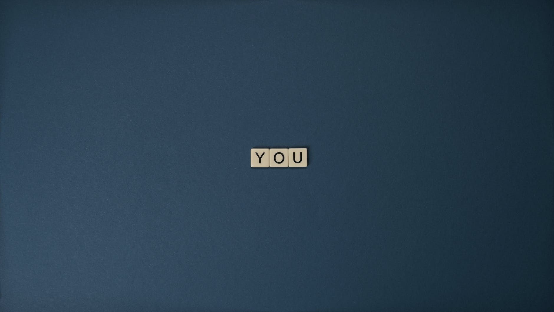 close up shot of text on a blue surface
