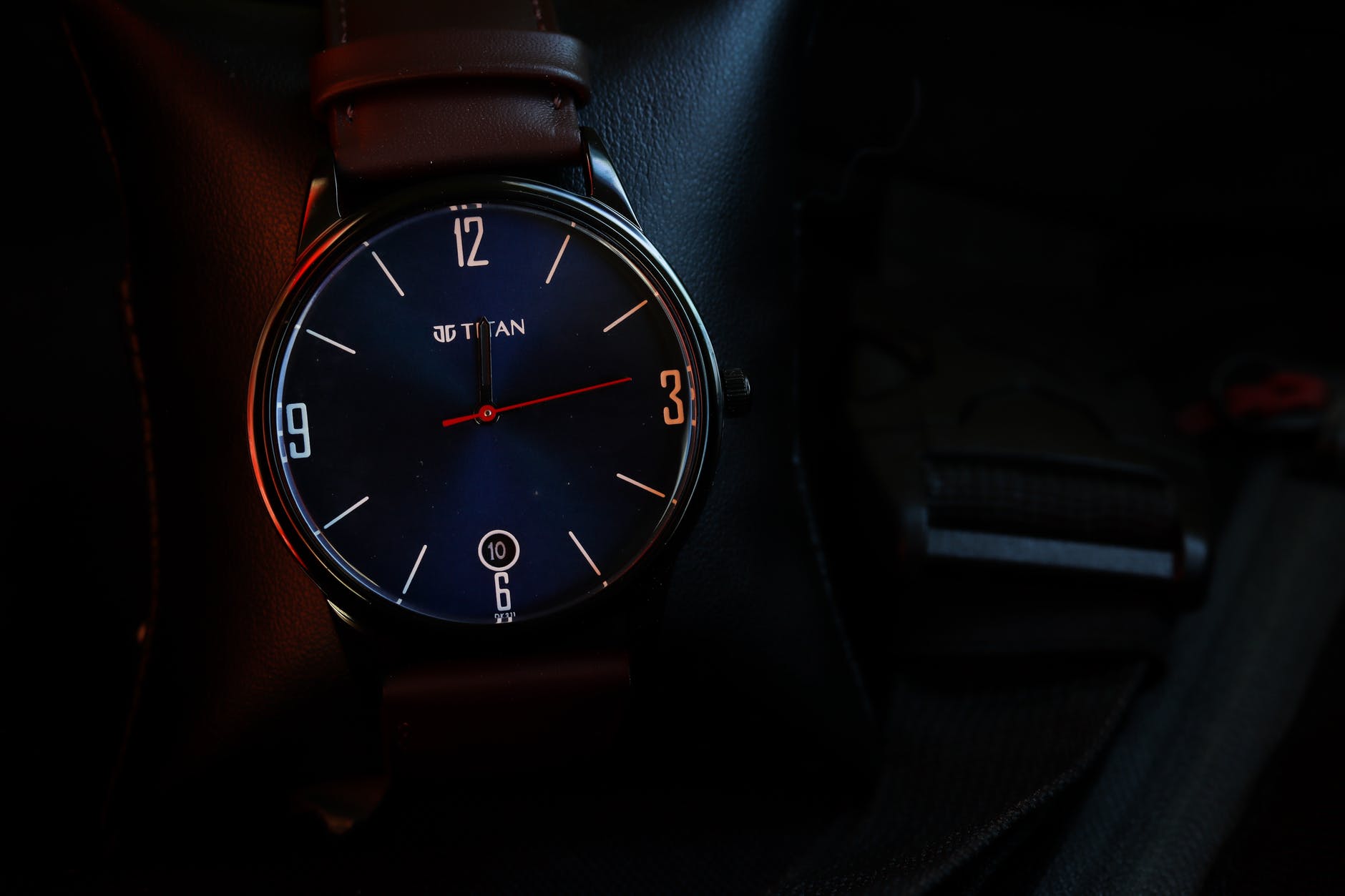 brown leather strap silver round analog watch