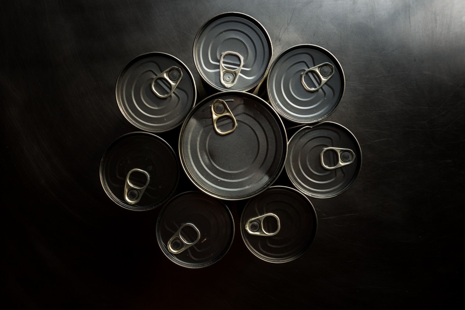 black and white round plastic containers