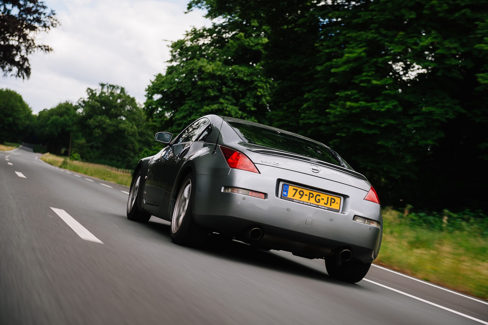 silver porsche 911 on road during daytime
