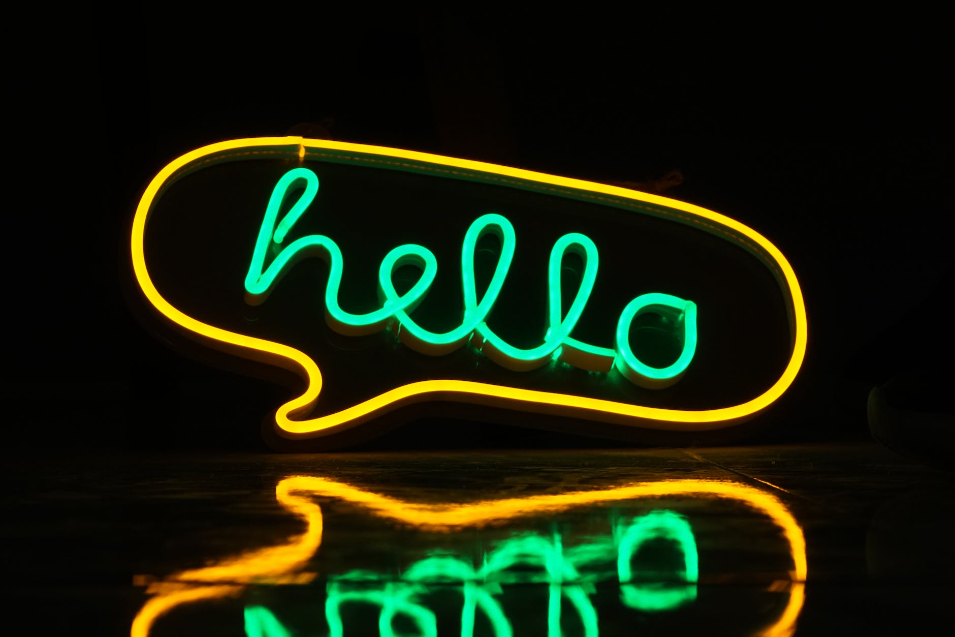 photograph of a hello neon sign