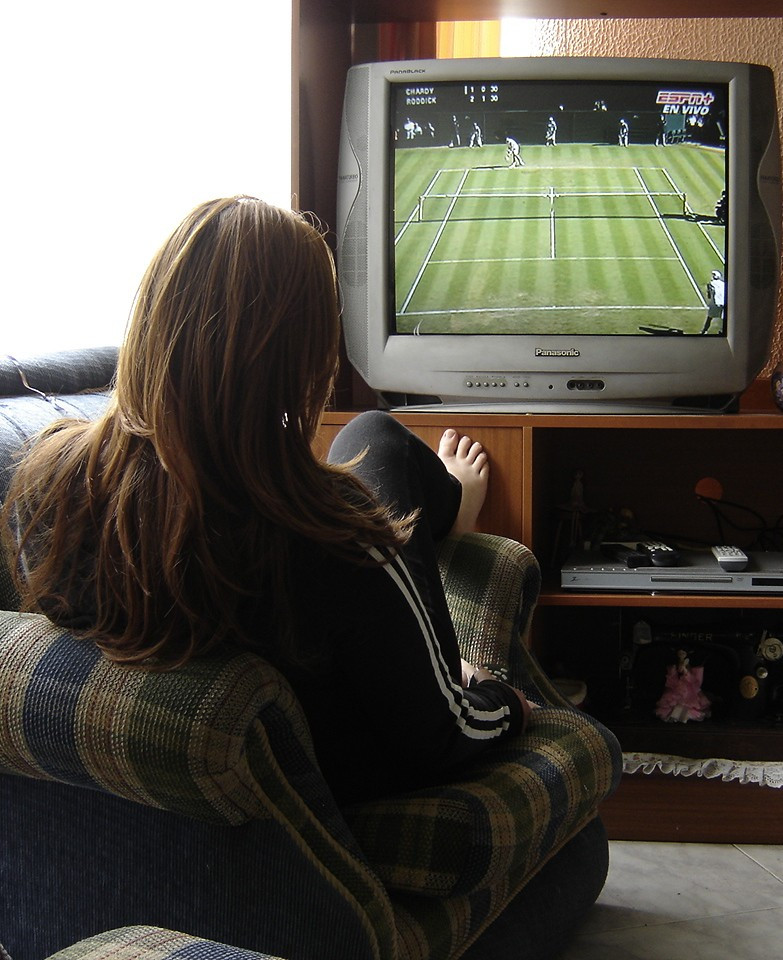 Women Watching Tennis Match On TV