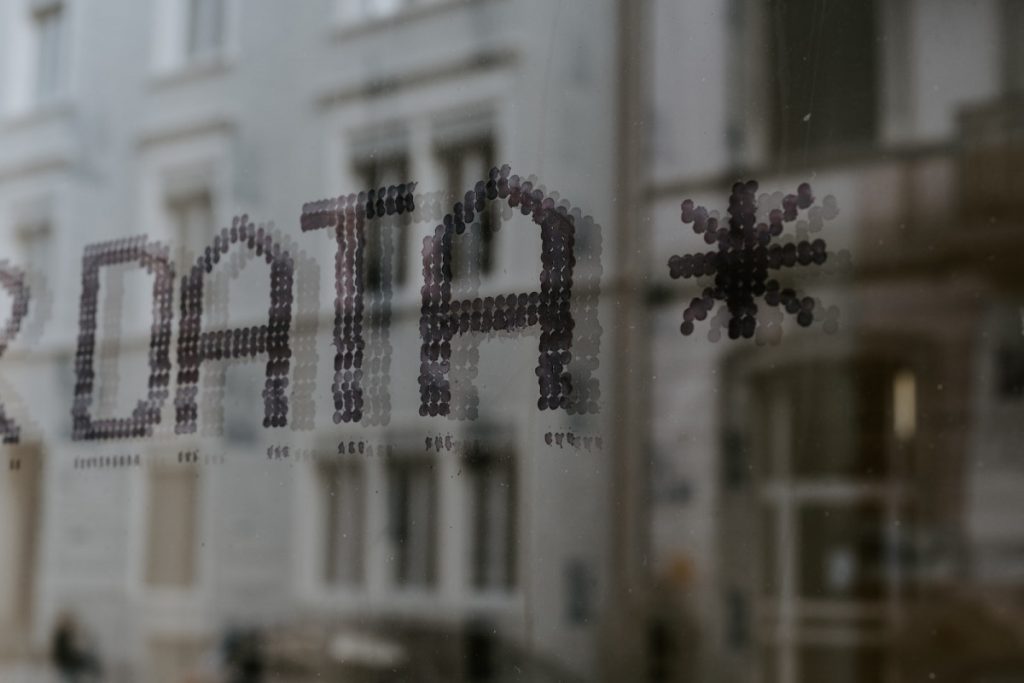 A close-up of a window embedded  with the word Data