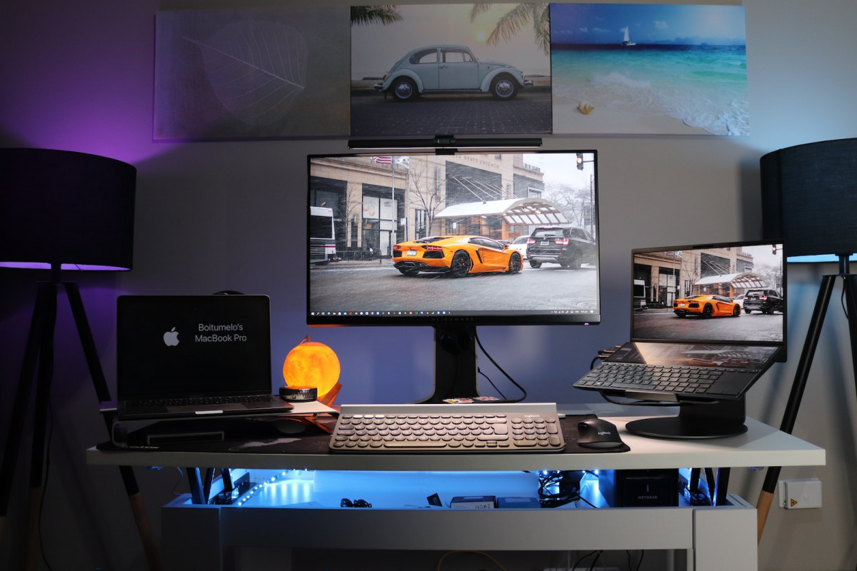 black laptop computer on white desk. Vehicle Registration Data API