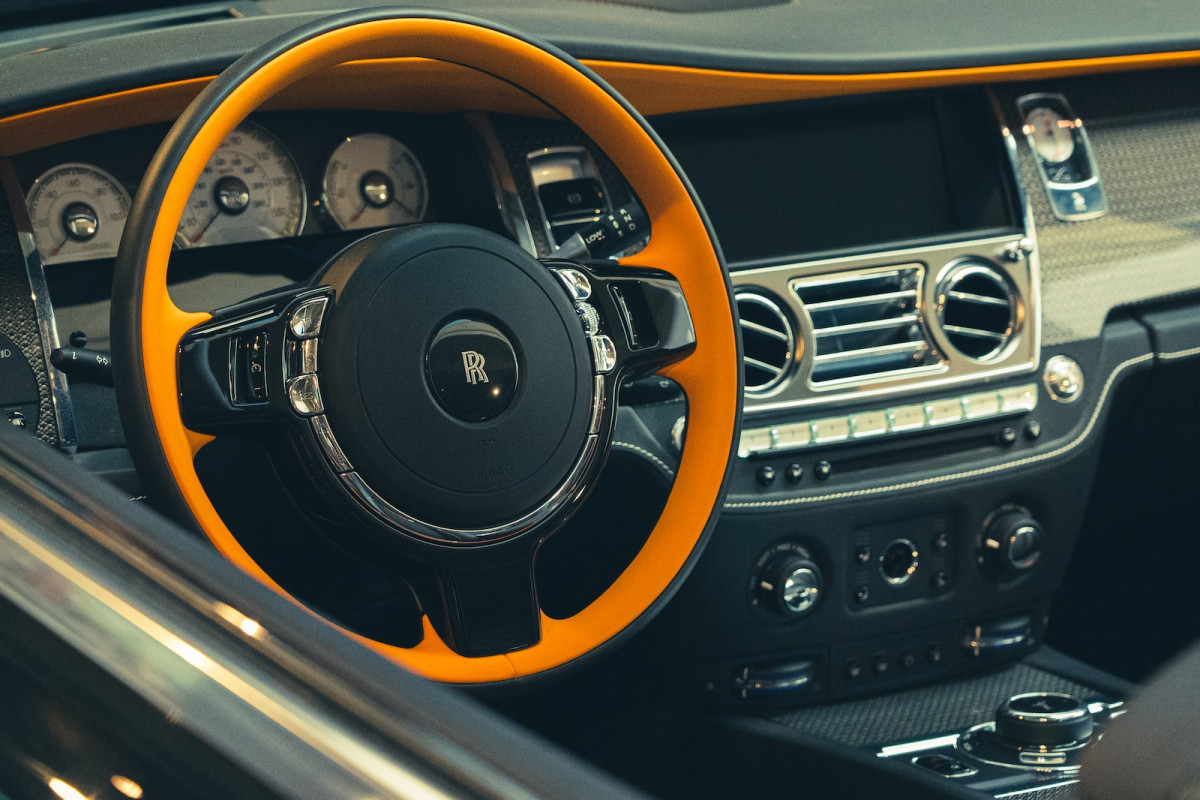 black and orange steering wheel. Vehicle Registration Data API