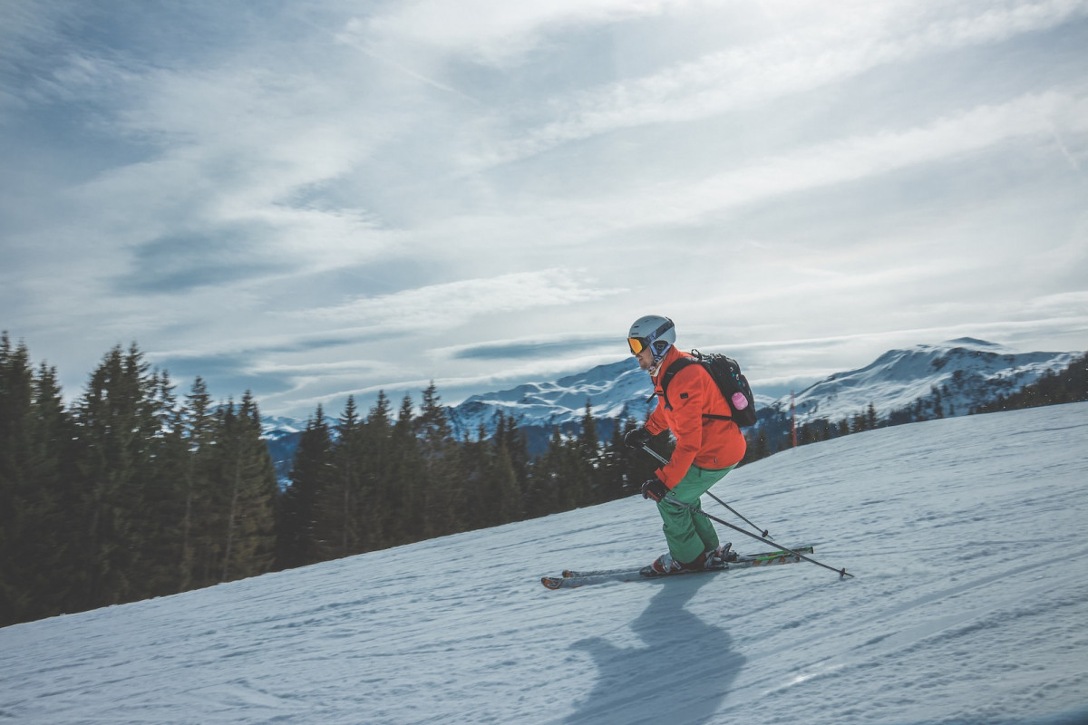 person using ski boards during daytime photography Skiing API