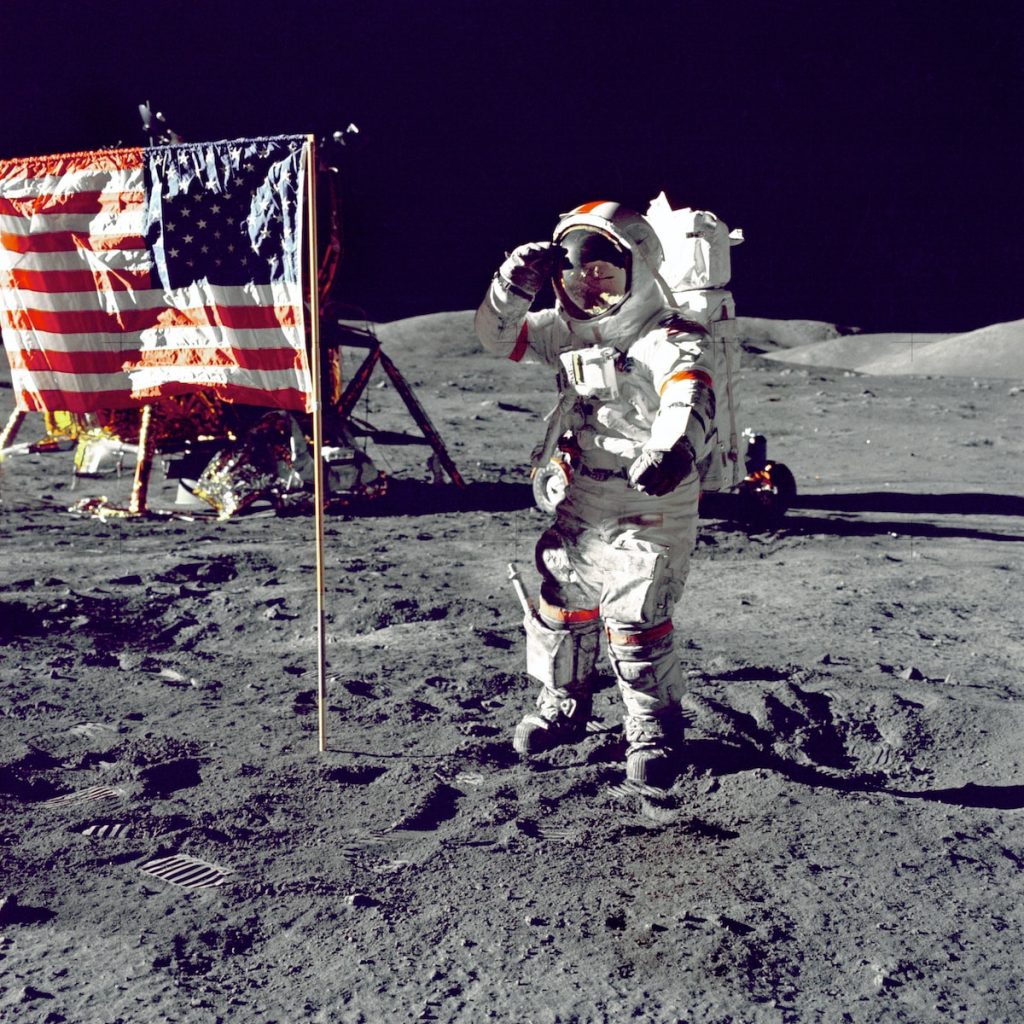 Events APIs - astronaut standing on moon beside U.S.A. flag